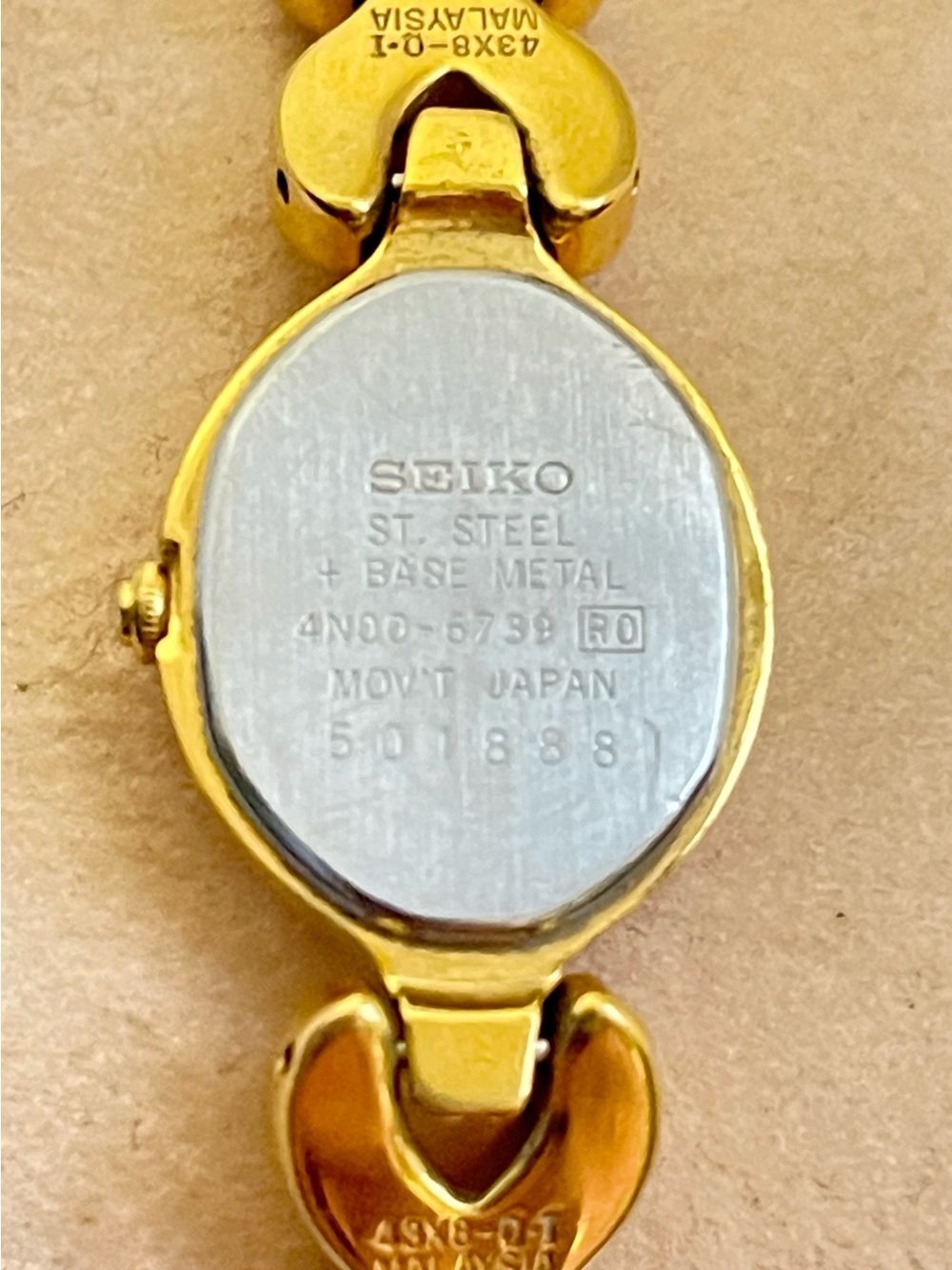 Seiko Women's Gold Tone Bracelet Watch with Silver Back